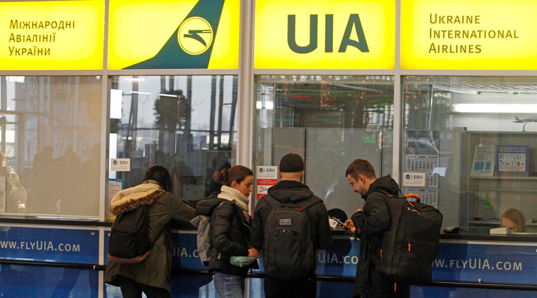 Customers wait to be served at the Ukrainian Airlines office at International Airport Boryspil in Kyiv, Ukraine of Jan. 8, 2020. (Pavlo Gonchar/SOPA Images/LightRocket via Getty Images)