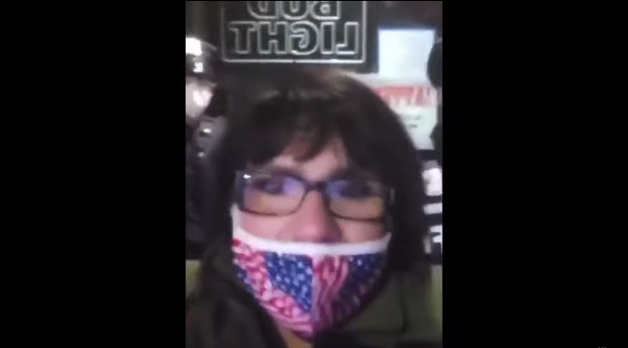 Staten Island Republican politician Leticia Remauro speaks to the camera during a December protest where she yelled "Heil Hitler." She has since apologized. (Screenshot)