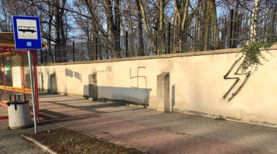 A swastika on the wall of a Jewish cemetery in Oświęcim, Poland on Jan. 10, 2021. (The Memorial and Museum Auschwitz-Birkenau)