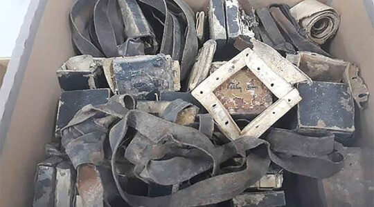 10 sets of tefillin that the Shem Olam Holocaust museum said were found in Warsaw, Poland. (Courtesy of Shem Olam Faith & the Holocaust Institute for Education, Documentation & Research)