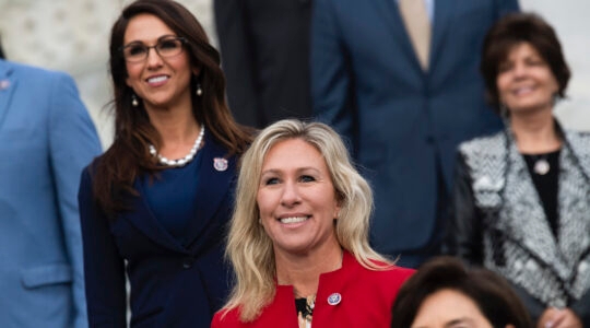 Reps. Marjorie Taylor Greene, R-Ga., and Lauren Boebert, R-Colo., left, are seen during a group photo with freshmen members of the House Republican Conference in Washington, D.C., on January 4, 2021. (Tom Williams/CQ-Roll Call, Inc via Getty Images)