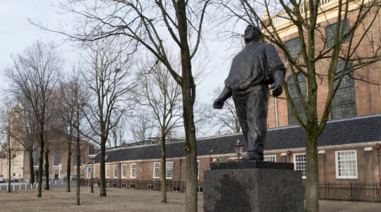 The Dock Worker, a statue that stands in front of the Portuguese synagogue, was inaugurated in 1952 to commemorate the participants of the 1941 February Strike in Amsterdam, the Netherlands. (Cnaan Liphshiz)