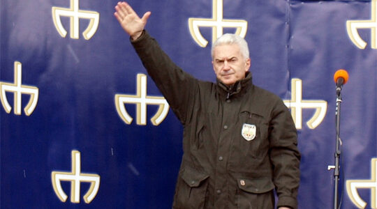 The far-right politician Volen Siderov lifts his arm at a political rally in Sofia, Bulgaria on March 11, 2011. (Wikimedia Commons)
