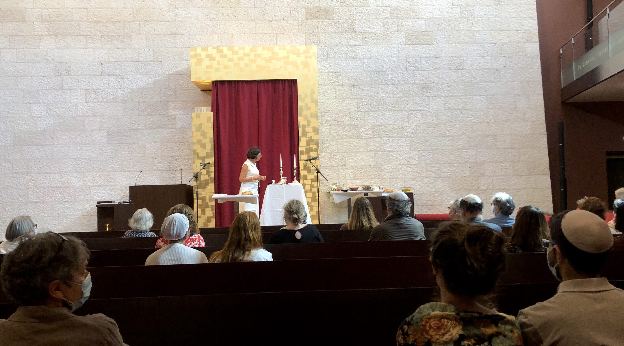 A member of the GIL Jewish community, Karin Rivollet, speaks about Judaism at the GIL synagogue in Geneva, Switzerland on Sept. 6, 2020. (Courtesy of GIL)