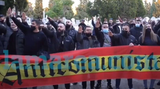 Neo-Nazis giving the Hitler salute at an event near a cemetery in Madrid, Spain on Feb. 13, 2021. (Lamarea.com)