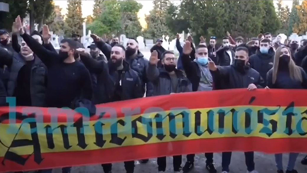 Neo-Nazis giving the Hitler salute at an event near a cemetery in Madrid, Spain on Feb. 13, 2021. (Lamarea.com)