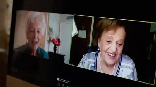 Betty Grebenschikoff, left, 91, reunites with Ana María Wahrenberg, 91, on a Zoom call. The two Holocaust survivors were best friends growing up in Germany and had been searching for each other for more than 80 years. (Courtesy of USC Shoah Foundation)