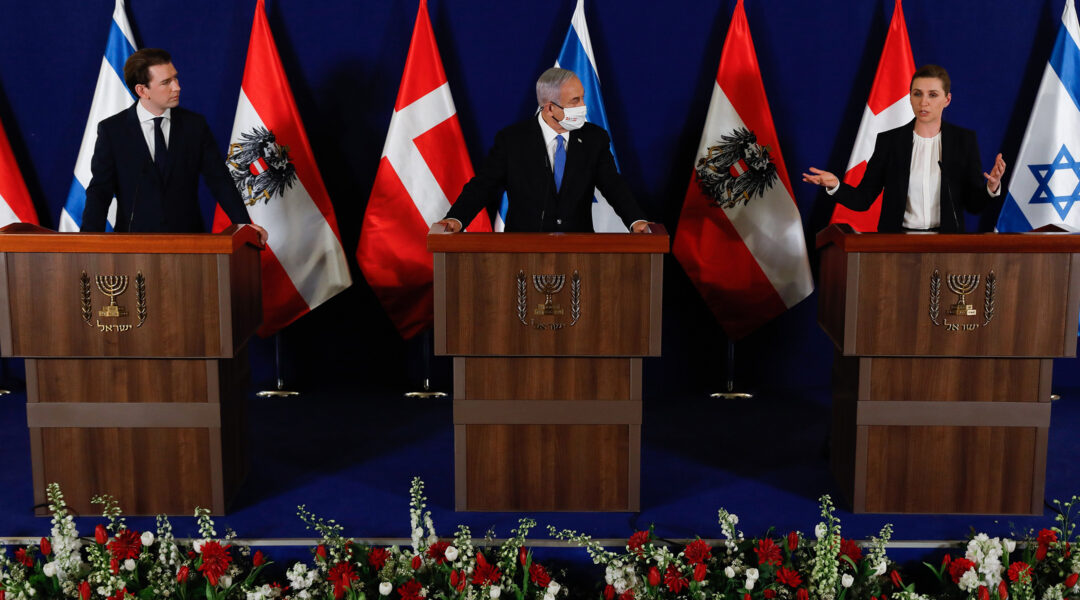 Israeli Prime Minister Benjamin Netanyahu, center, Danish Prime Minister Mette Frederiksen, left, and Austrian Chancellor Sebastian Kurz give a joint press conference at the prime minister's office in Jerusalem, Israel on 4 March 2021. (Olivier Fitoussi / POOL / AFP) (Photo by OLIVIER FITOUSSI/POOL/AFP via Getty Images)