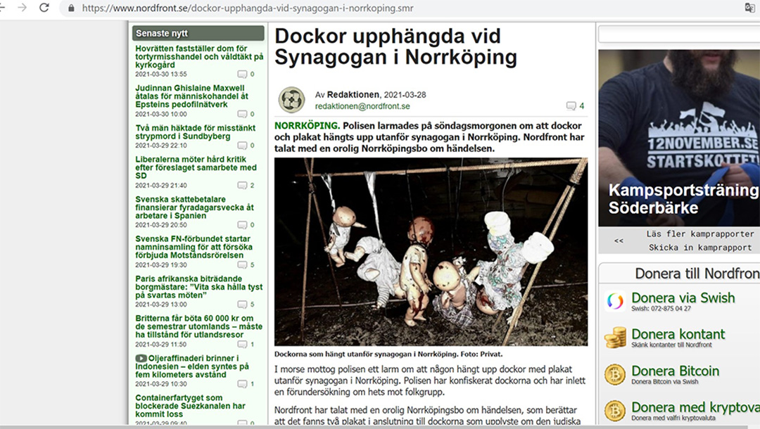The website of the Nordic Resistance Movement features a picture of dolls hanged outside the synagogue of Norrkoping, Sweden on March 28, 2021. (NRM)
