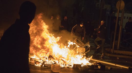 A fire burns amid violent protests in Jerusalem on April 22, 2021. (Olivier Fitoussi/Flash90)