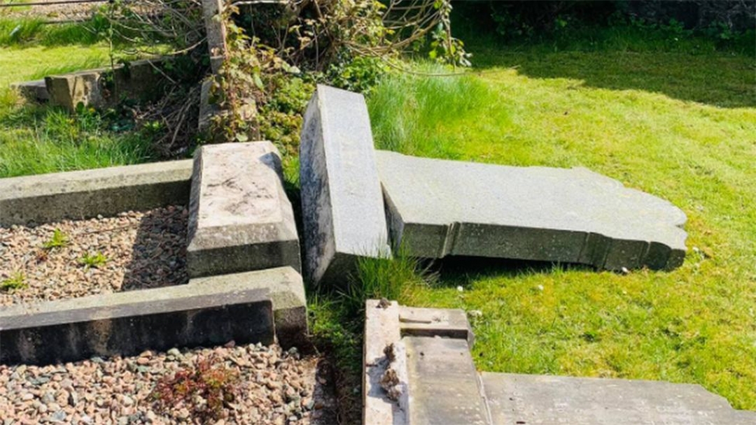 The aftermath of vandalism at the Jewish section of a municipal cemetery in Belfast, UK on April 16, 2021. (Courtesy of Steven Corr)