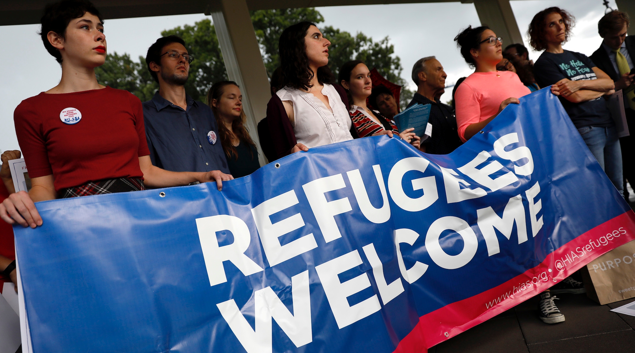 Activists hold a banner during a demonstration organized by HIAS outside the U.S. Capitol on September 14, 2017.(Aaron P. Bernstein/Getty Images)