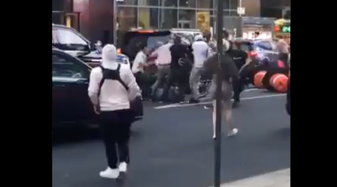 A frame from a video shows a Jewish man being beaten on the street in New York City on May 20, 2021. (Screenshot from Twitter)