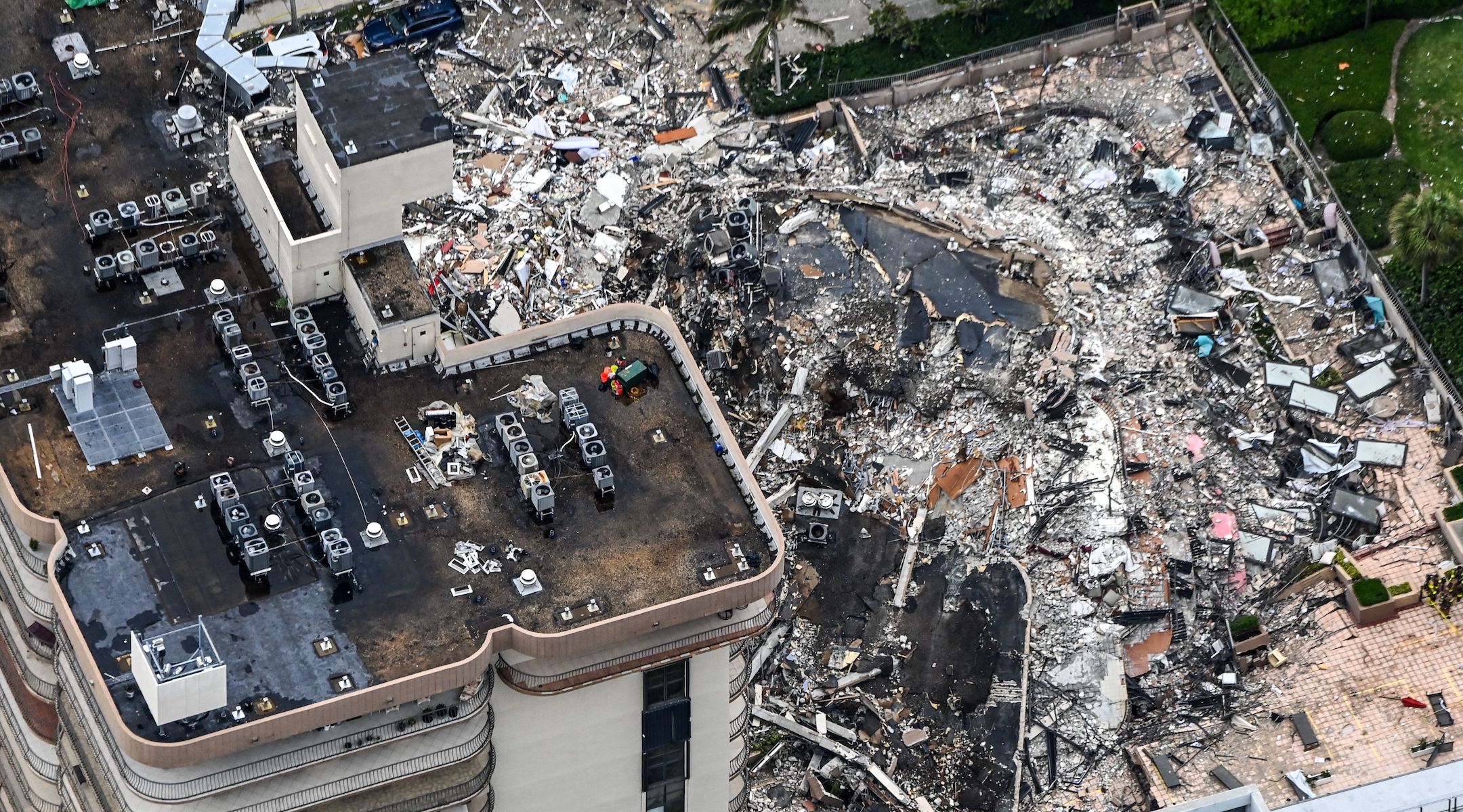 Search and rescue personnel working on site after the partial collapse of the Champlain Towers South in Surfside, Florida on June 24, 2021. (Chandan Khanna/AFP via Getty Images)