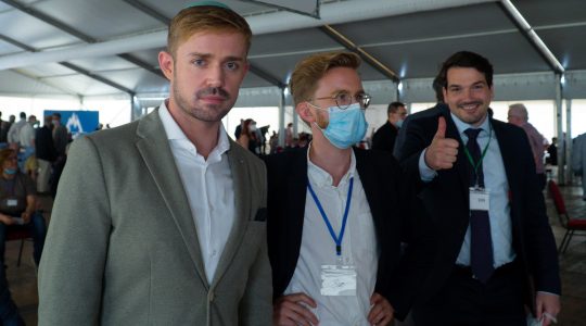 Marcel Goldhammer, left, Julian Potthast and Robert Eschricht attend a political event of their Alternative for Germany party in Berlin, Germany on June 14. (Courtesy of Goldhammer)