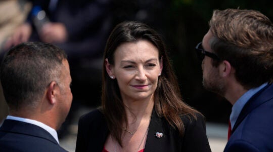 Nikki Fried arrives for a ceremony with President Joe Biden