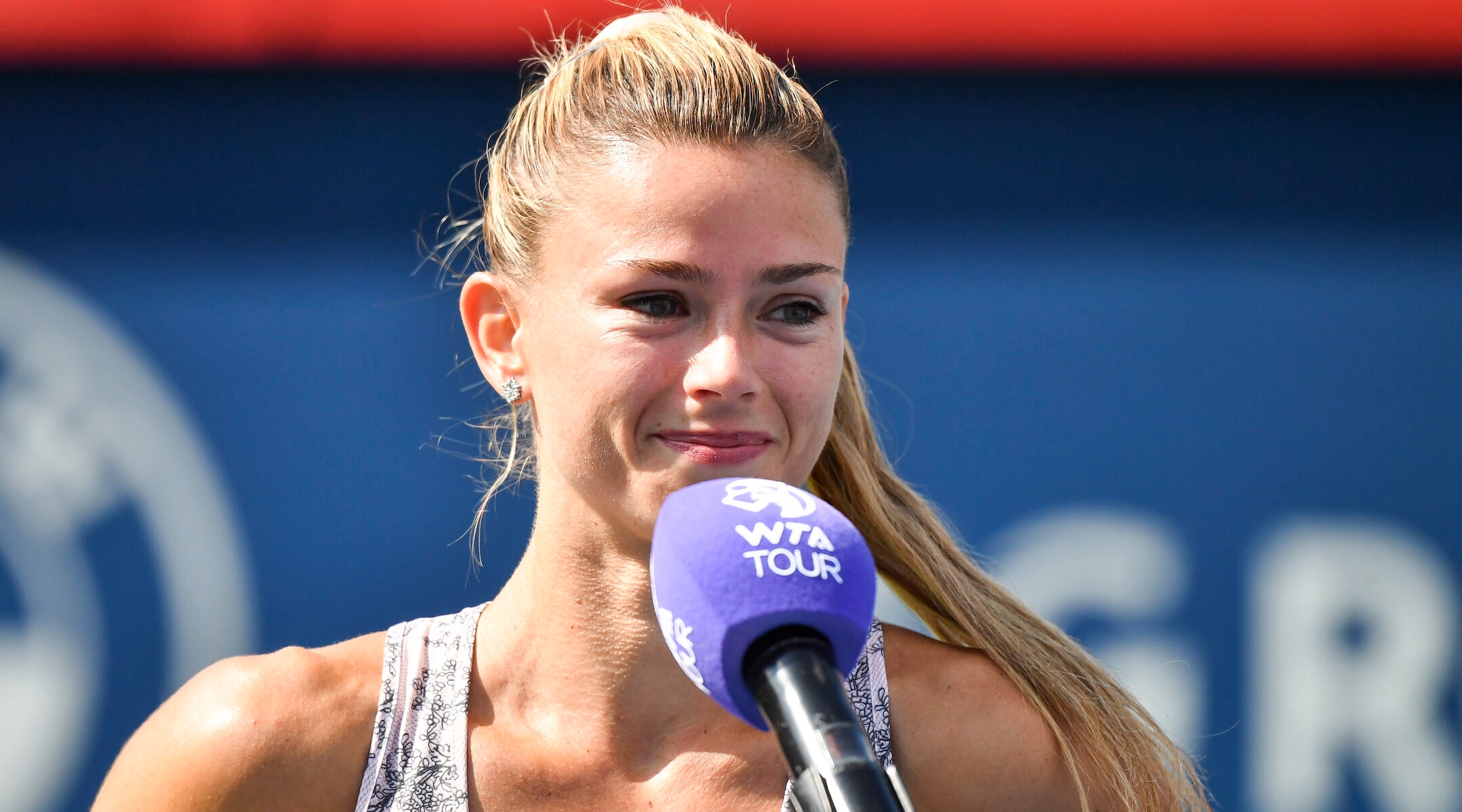 Camila Giorgi addresses spectators after winning the National Bank Open