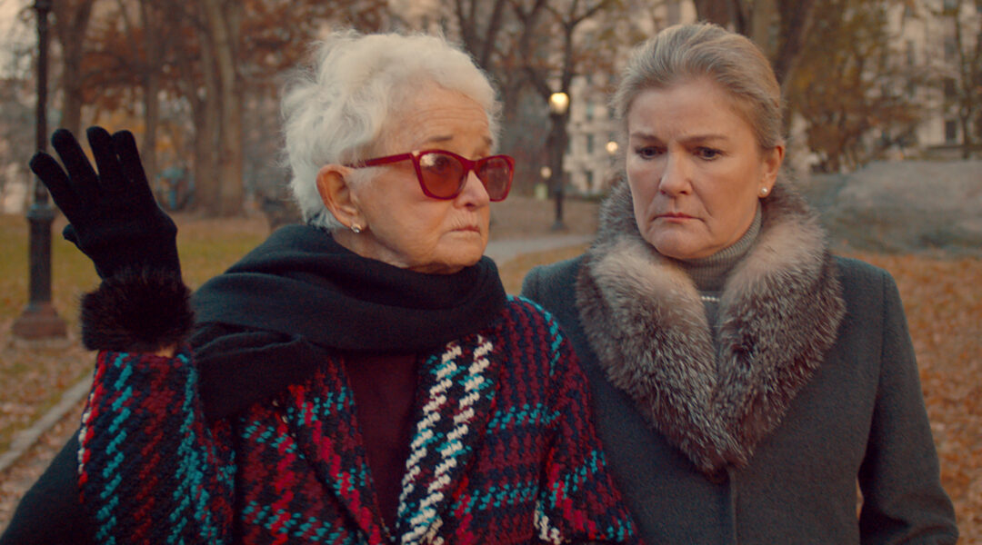 Two women walking in a park