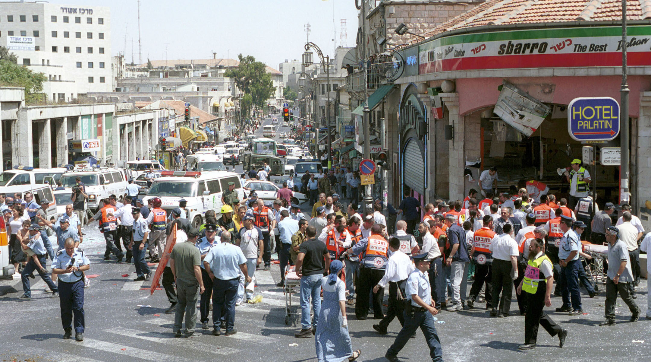 medics treat the wounded after the Sbarro suicide bombing