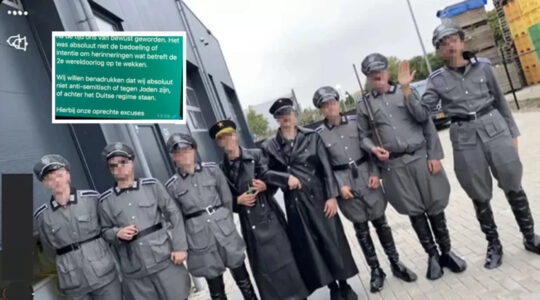 Men wear Nazi uniform during a COVID-19 protest in Urk, the Netherlands on Sept. 10, 2021. Hart van Nederland