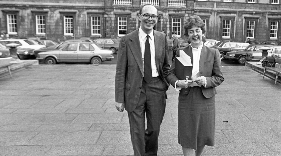 Late minister Mervyn Taylor and lawmaker Nuala Fennell stand in front of praliament in Dublin, Ireland on Nov. 4, 1982. (Independent News And Media/Getty Images)