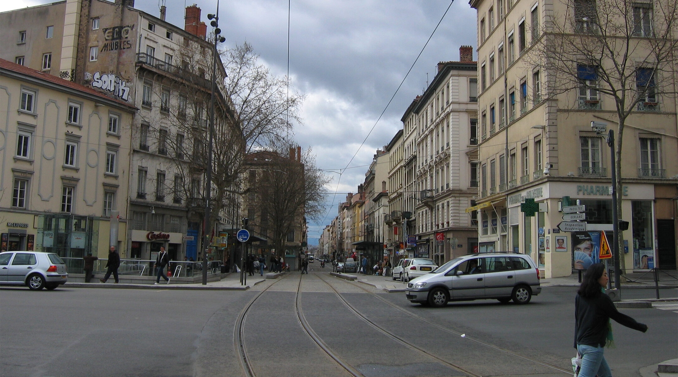 Pedestrians and cars cross Gebrial-Peri Square in Lyon, France on March 28, 2005. (Wikimedia Commons)