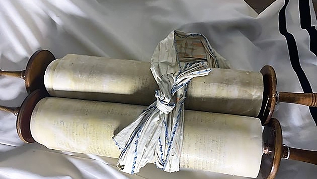 A Torah scroll that the Nazis stole from a Czech congregation on display at The Memorial Scrolls Trust in London, UK. (Courtesy of the European Union for Progressive Judaism)
