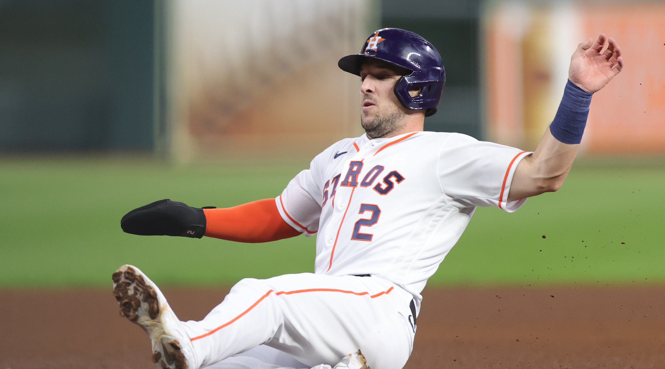 Alex Bregman slides into third base