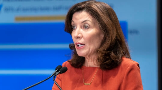 New York State Governor Kathy Hochul holds a COVID-19