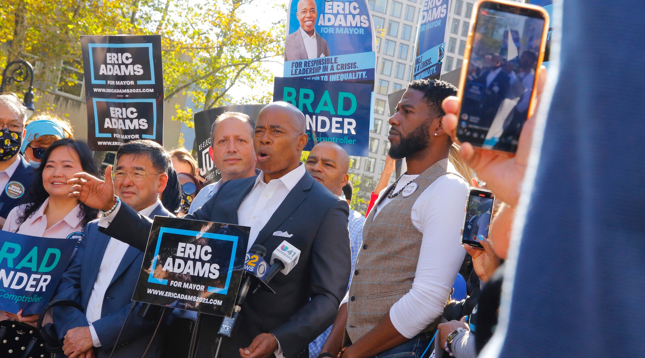Eric Adams and other Democrats at a rally in Brooklyn