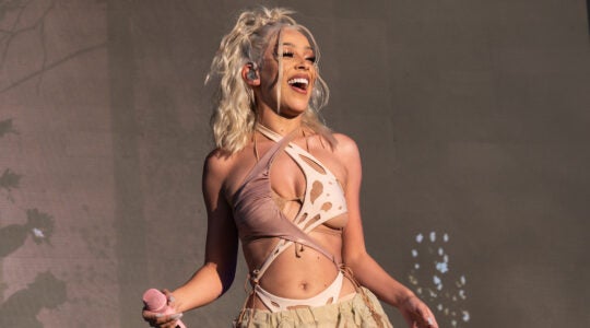 Doja Cat performing onstage