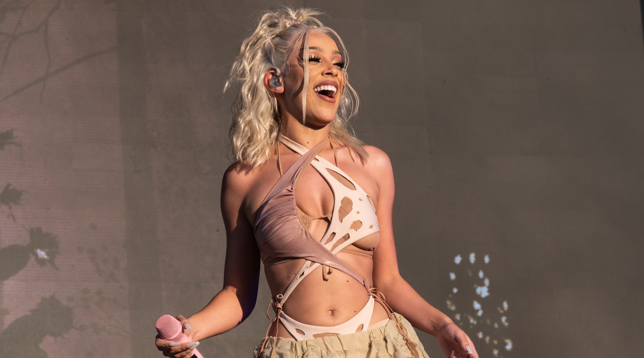 Doja Cat performing onstage