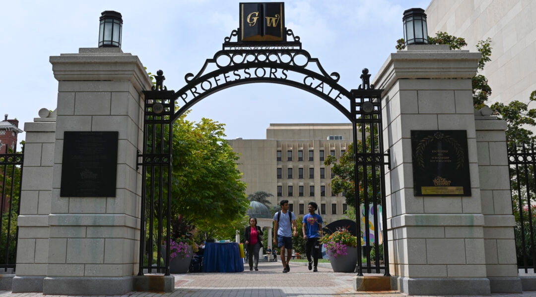 George Washington University students pass through campus
