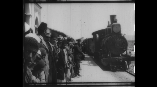 1800s footage of people waiting for a train