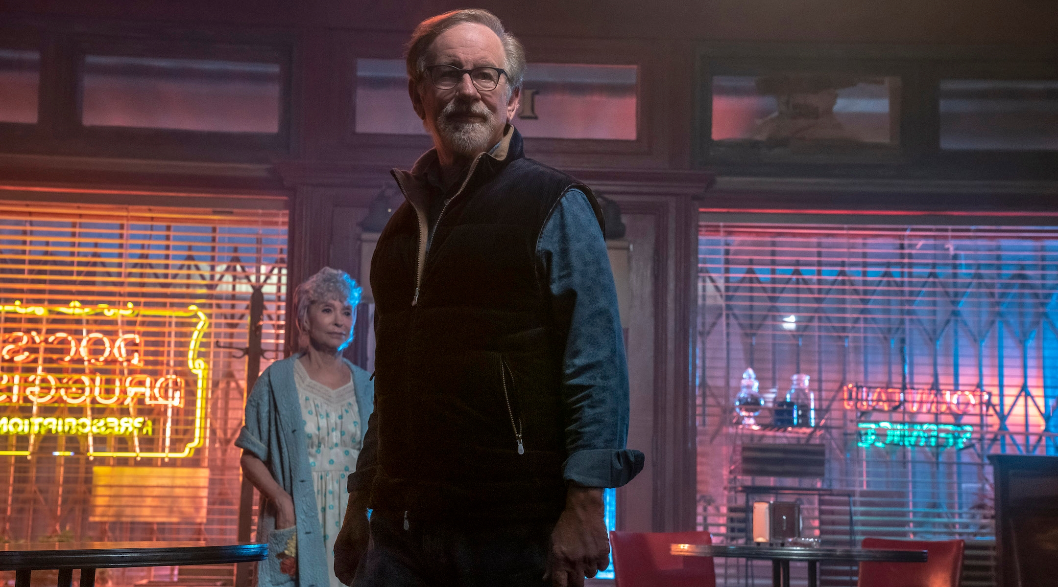 Steven Spielberg and Rita Moreno in a diner set