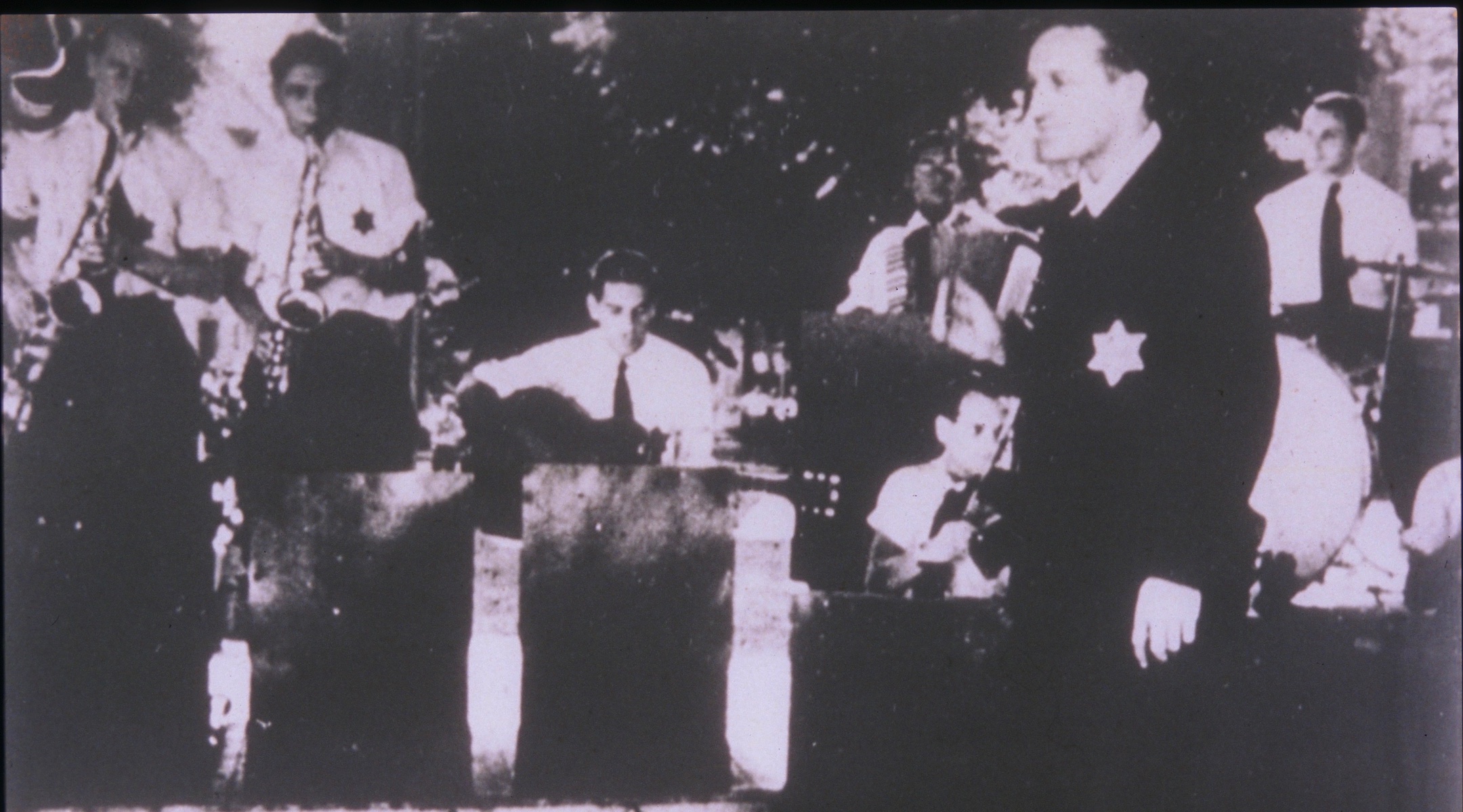 Black-and-white photograph of Jewish musicians in a concentration camp