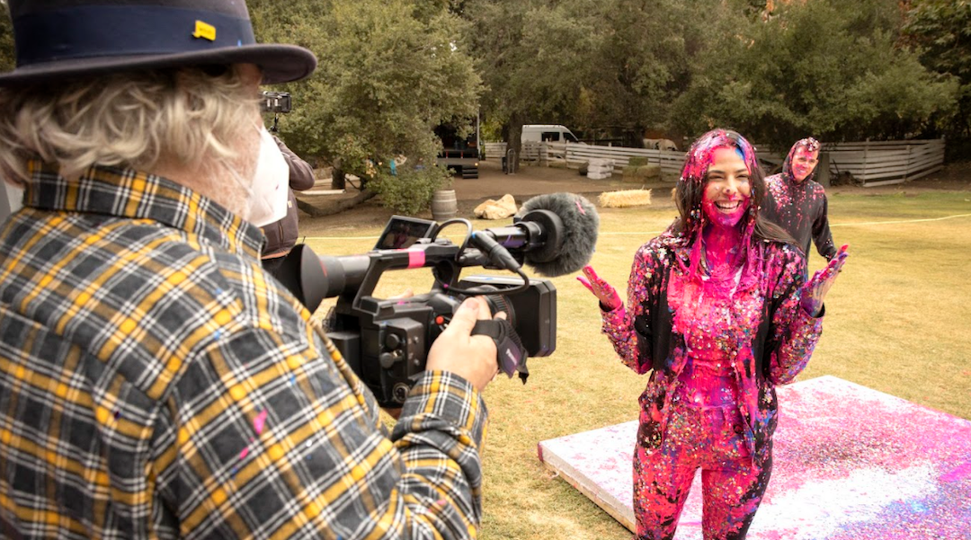 Rachel Wolfson doused in pink paint