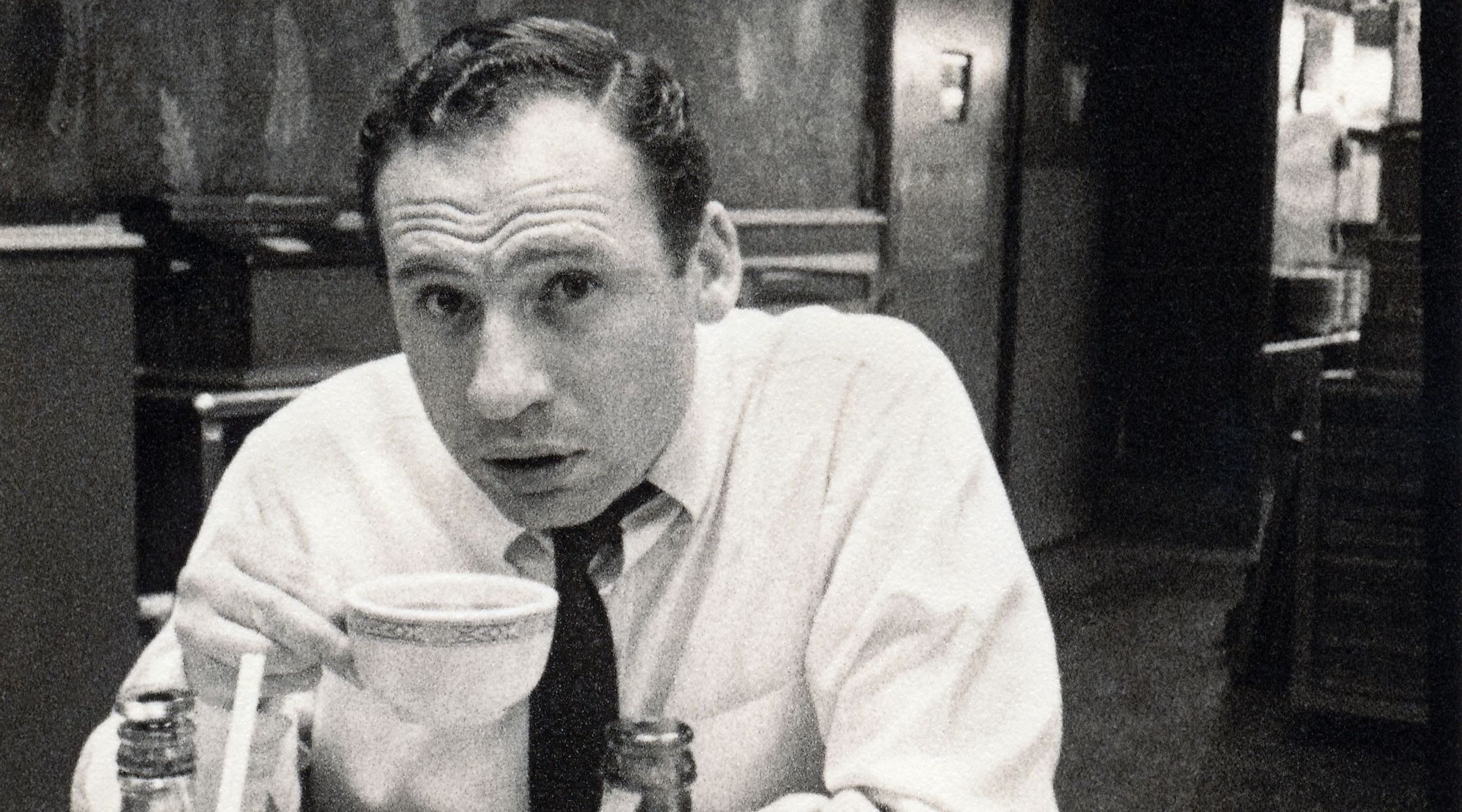 Mel Brooks drinking coffee