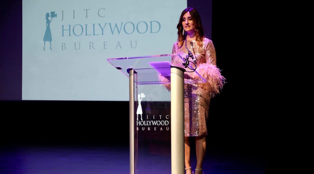 A woman at a podium