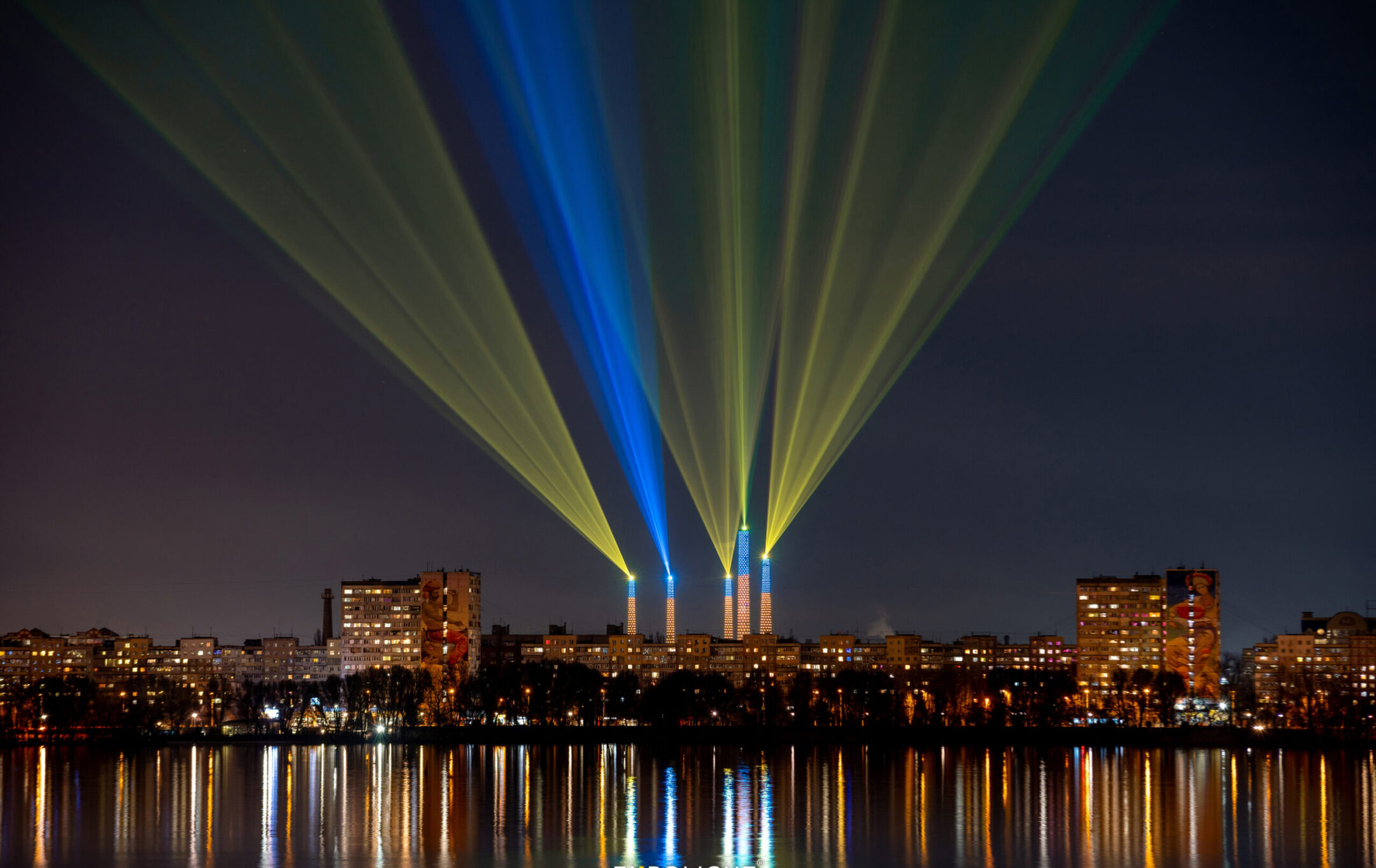 The skyline of Dnipro was lit up with lasers for Ukraine’s Day of Unity, Feb. 16, 2022. Russian forces invaded the country just over a week later. (Mykola Miakshykov/ Ukrinform/Future Publishing via Getty Images)