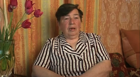 A woman sitting on a couch