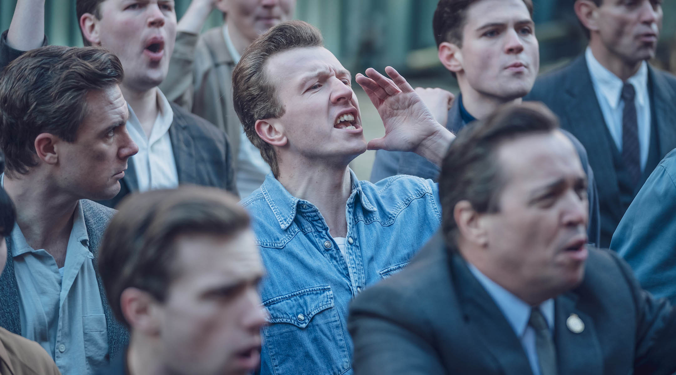 A man shouting in a crowd
