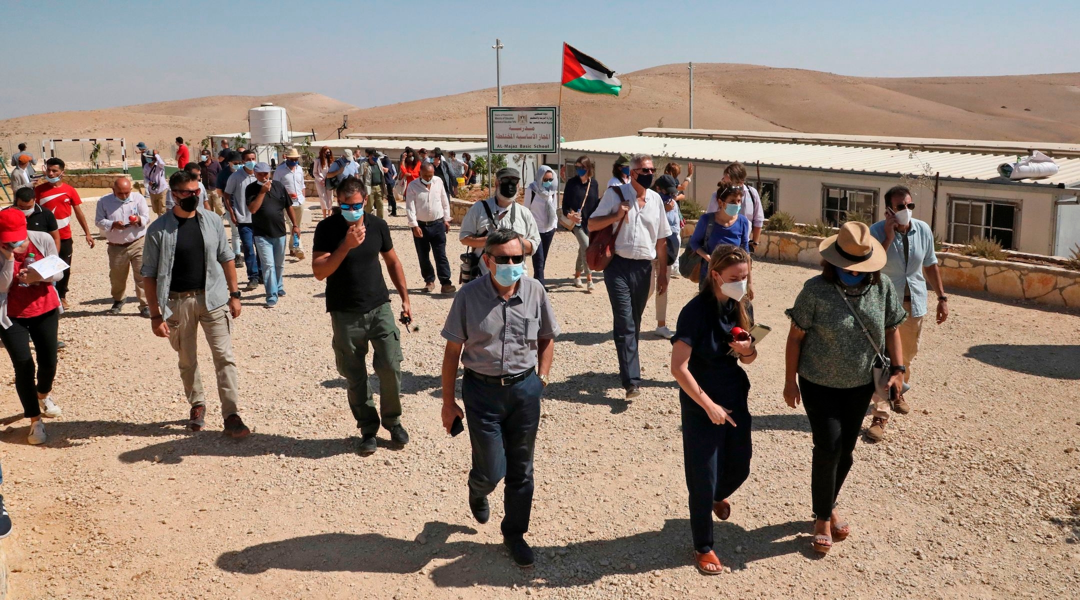 People marching in the desert