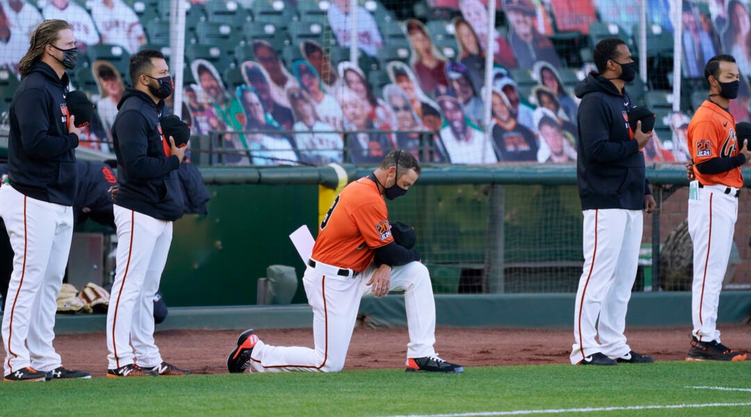 Gabe Kapler kneeling