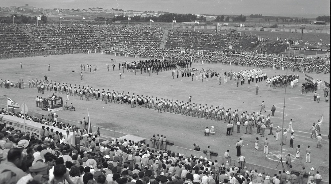 A sports stadium with fans