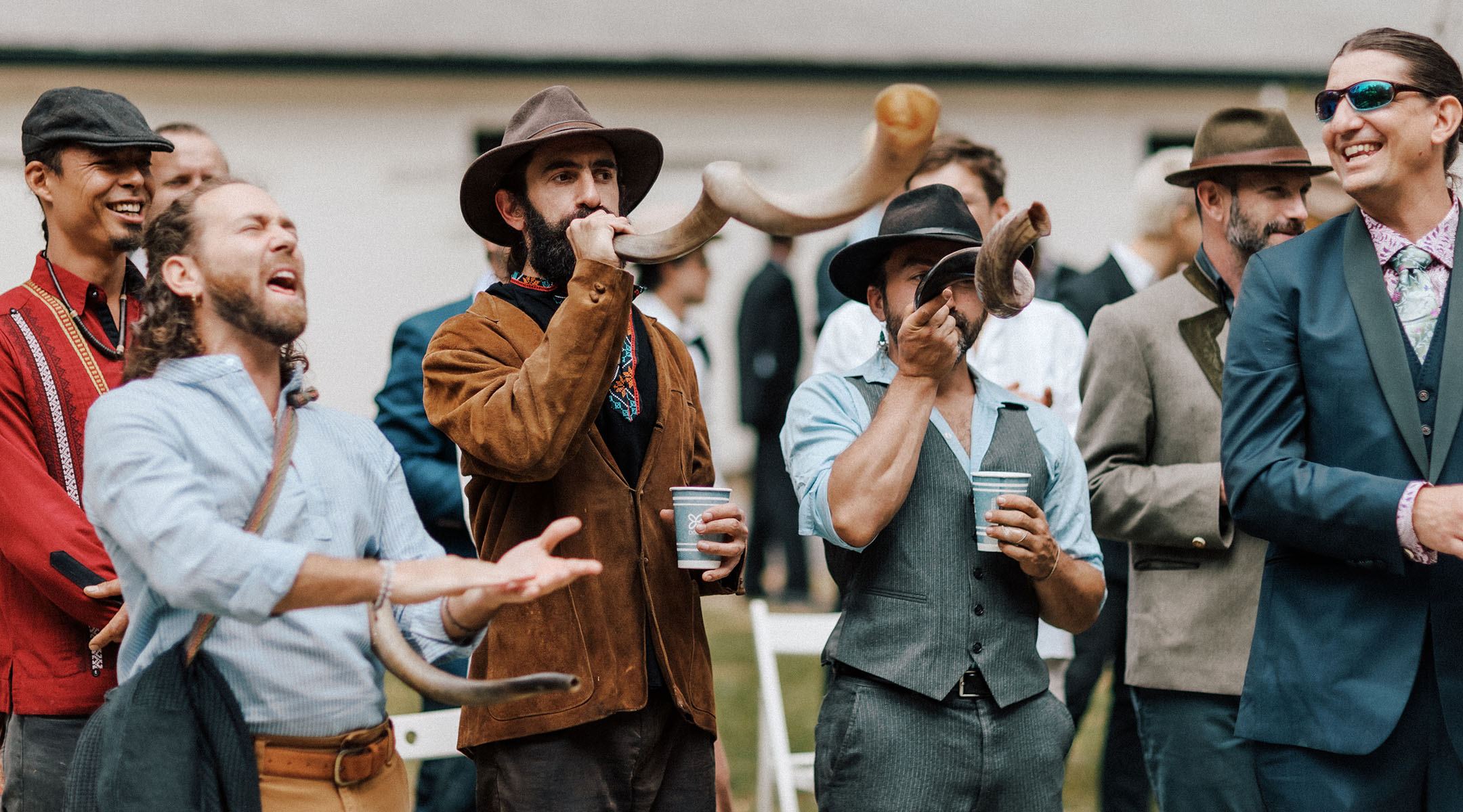 men blow shofars