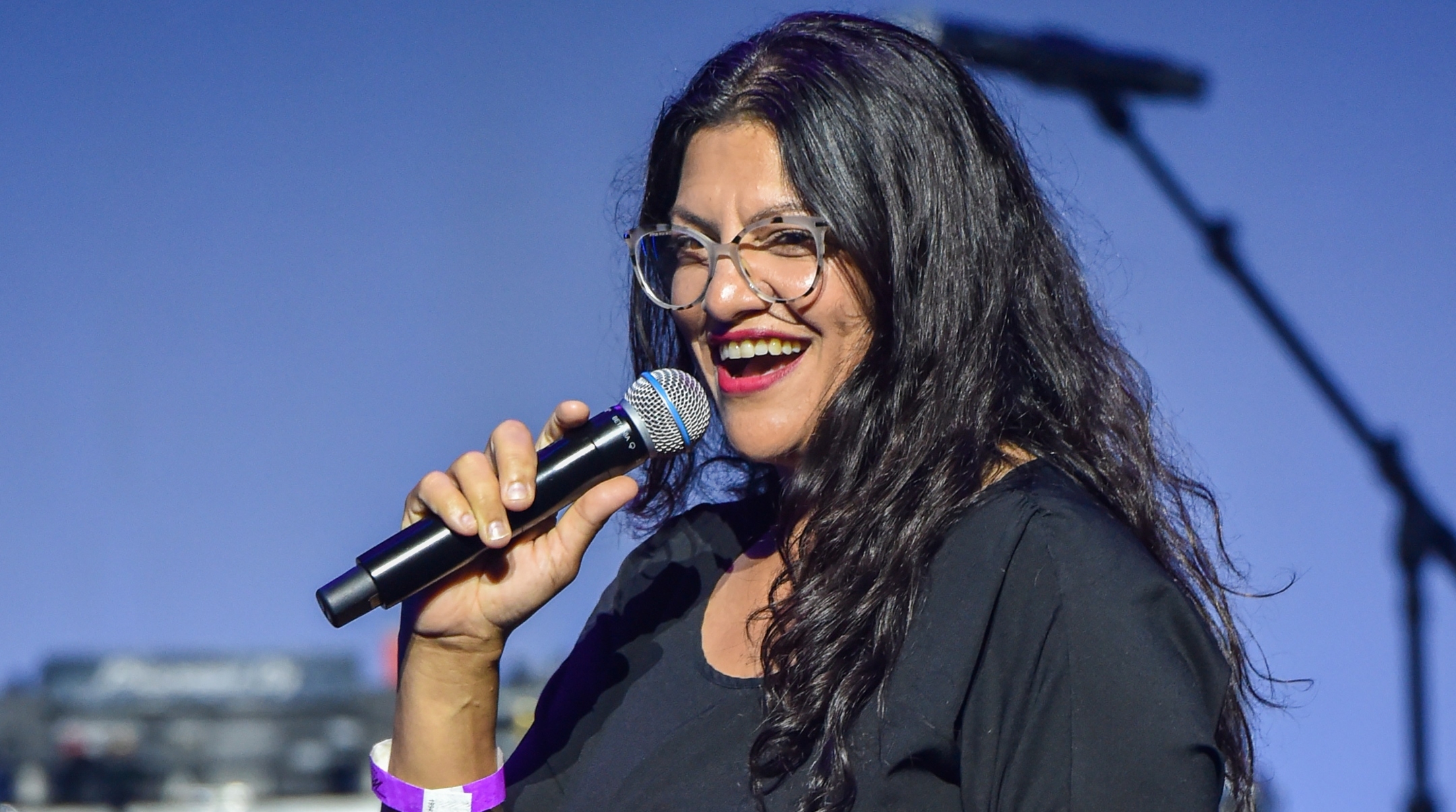 Michigan House Rep. Rashida Tlaib speaks on stage at a concert in Detroit, July 16, 2022. (Aaron J. Thornton/Getty Images)