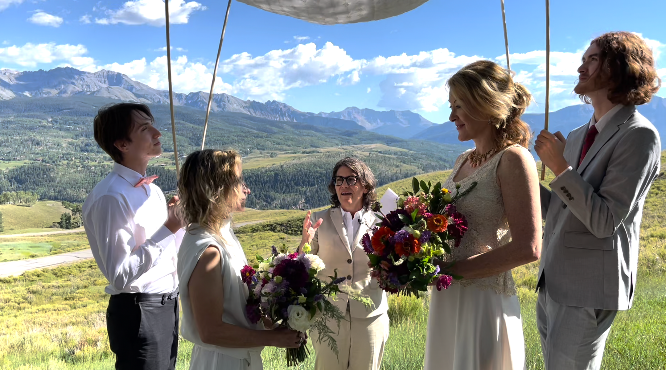 Two women getting married outside