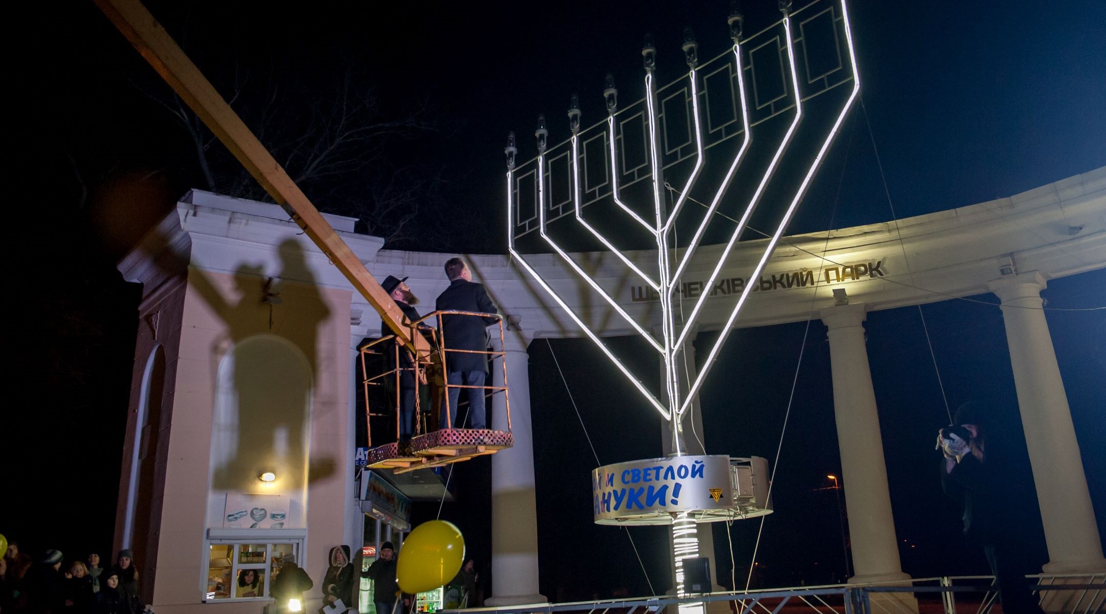 Rabbi Wolff lights a menorah in Kherson