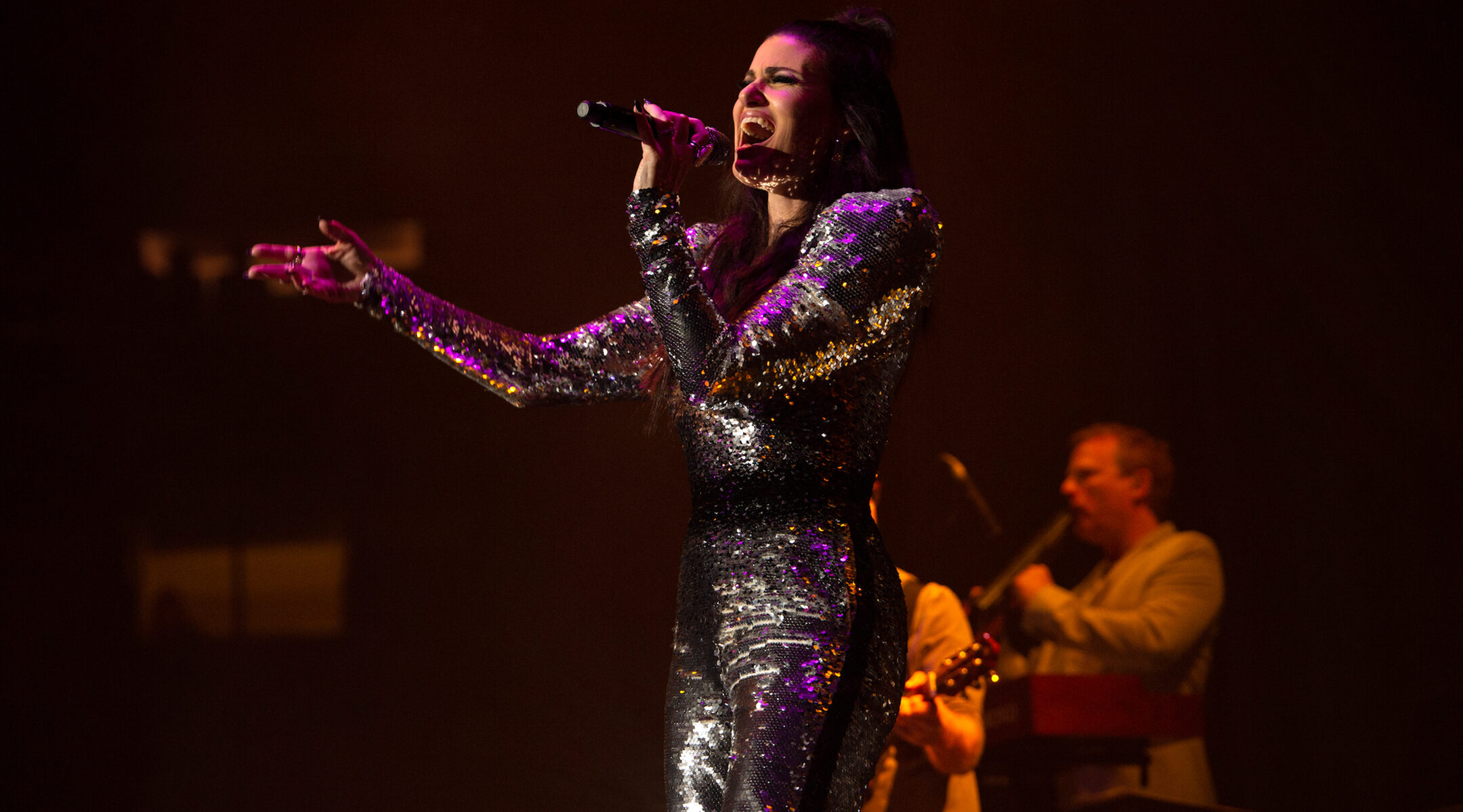 Idina Menzel on stage singing